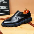 Shiny black men's dress shoe with blue welt and chunky lug sole detail. - 37 / Black