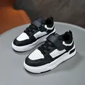 Stylish kids black and white leather casual sneakers with velcro strap and durable sole - 27 / Black and White