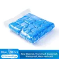 Pack of 100 blue disposable thickened PE plastic shoe covers for indoor protection - 100 Pieces Pack / Blue