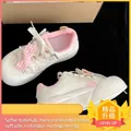 Zapatillas para niñas con lazo de cuadros rosa y suela gruesa suave para uso diario - Rosa