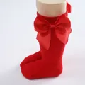Classic red children's knee-high socks with a large satin bow, perfect for girls - Red / Size S (0-1 Year)