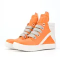 High-top orange sneakers with oversized tongue and thick laces on white background - 35 / Orange