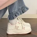 Sweet white platform sneakers with pink butterfly details for a cute casual look. - 31 / Pink
