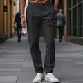 Detail of men's dark grey slim fit casual trousers with drawstring waist - S / Bottoms / Black