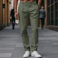Close-up detail of olive green men's business casual trousers with drawstring waist - S / Bottoms / Army Green