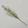 Detailed view of delicate purple artificial daisy branch with realistic green foliage decor - Purple