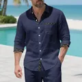 Close-up of navy blue linen resort shirt with seagull print trim on collar and cuffs. - S / Tops / Navy Blue