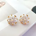 Vintage round hollow white enamel stud earrings with golden woven pattern detail - Round White
