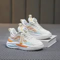 Baskets en maille respirante pour garçons blanches avec accents orange et bleu et lacet à cadran - 26 / Orange JT