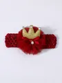 Detailed macro view of red tulle flower and sparkly gold crown on baby crochet headband - Burgundy