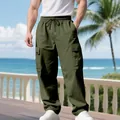Dettaglio della vestibilità e delle tasche dei pantaloni cargo verde oliva ampi - XS / Pantaloni e gonne / Verde militare
