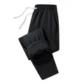 Men's black thick fleece-lined sweatpants with white drawstrings for winter warmth - S / Bottoms / Black