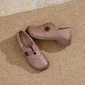 Comfortable brown leather-like slip-on shoes for elderly women with decorative flower detail - 36 / Dusty Pink
