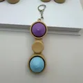 Baozi-fidget-sleutelhanger met paarse en blauwe knoppen voor stressverlichting - Baozi Spinner Stijl (2 Knoppen) / Geen Licht