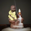 Zen little monk purple clay backflow incense burner featuring waterfall smoke effect - Kung Fu Boy (Yellow)
