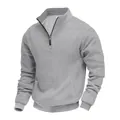 Dettaglio felpa grigia da uomo con texture a nido d'ape e mezza zip frontale sportiva - Grigio chiaro