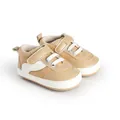 Detailed side view of khaki and white baby canvas walking shoes with velcro straps - 11cm / Apricot