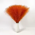 Vibrant orange artificial pampas grass in white ceramic vase for home wedding decor - Orange Red