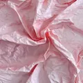 Macro texture detail of light pink crumpled hand-rubbed paper for DIY flower crafts - Hot Pink