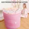 Large pink vacuum compression storage bag for quilts and clothes shown in home setting - Random Color / 70*50 / Macaron Color Small
