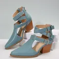 Detailed side view of blue pointed-toe chunky heel sandals with vintage buckle straps - 36 / Blue