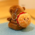 Adorable brown Capybara plush keychain with a cute mini hamburger backpack design - Smiling Burger Backpack
