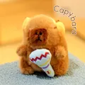 Adorable brown capybara plush toy wearing yellow earmuffs and holding a plush microphone. - Music Style with Microphone - Faux Mink Fur