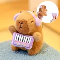 Cute capybara plush keychain with headphones and keyboard, vibrating pull-string toy. - Retractable Electronic Organ Toy