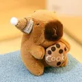 Cute brown capybara plush toy wearing a knitted hat and holding a cookie accessory. - Approx. 12cm / Capybara Holding Cookie