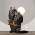 Ceramic backflow incense burner featuring a Zen mountain design with warm moon LED light - Returning Home Under The Moon
