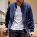 Close-up detail of navy blue suede bomber jacket featuring premium texture and smooth zipper - S / Tops / Navy Blue