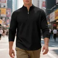 Felpa da uomo con mezza zip in maglia a nido d'ape nera in un ambiente urbano moderno - Taglia S / Top / Nero