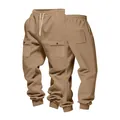Dettaglio dei pantaloni cargo pesanti color kaki con coulisse in vita e ampie tasche - Taglia S / Pantaloni e gonne / Cammello