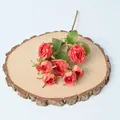 8-head artificial coral roses with burnt edge detail on a wooden slice - Watermelon red