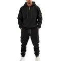 Full body view of a man wearing a black heavyweight cargo hoodie and jogger tracksuit - M / Top And Bottom / Black