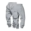Vista dettagliata dei pantaloni cargo pesanti grigi con coulisse e tasche - Taglia S / Pantaloni e gonne / Grigio chiaro