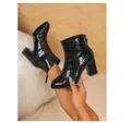 Detailed shot of black crocodile-embossed pointed-toe ankle boots with block heels - 35 / Black