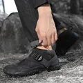 Black quilted outdoor snow shoes with fleece lining and adjustable buckle strap. - 36 / Black