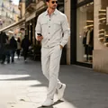 Full-body street view of a man in a grey corduroy shirt and trouser leisure suit - S / Top And Bottom / White