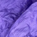 Detailed close-up texture of purple wrinkled handmade tissue paper for DIY flower making. - Deep purple
