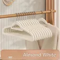 Almond white flocked clothes hangers with non-slip and non-marking design for sweaters - Almond White