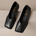 Elegant black square-toe leather loafers for women with stylish V-cut vamp design. - 35 / Black