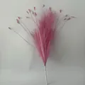 Detailed view of pink artificial pampas grass with decorative butterfly-like petals. - Rose Red