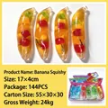 Translucent banana shaped stress relief squishy toy with colorful fruit slices inside - Crystal Mud Filling / Banana Squishy