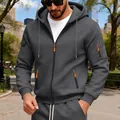 Close-up of men's grey zip-up hoodie with functional arm pockets and orange zipper details - M / Tops / Dark Gray