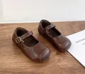 Classic brown Mary Jane shoes for girls with adjustable buckle strap and soft sole - Size 23 / Brown