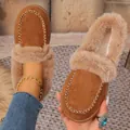 Cozy brown suede winter moccasins with warm faux fur lining and decorative stitching. - Dark Brown
