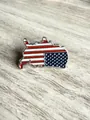 Detailed close-up of a US flag themed brooch in USA map shape with enamel stripes - Map Shape / 1.8x2.5cm