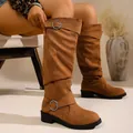Stylish brown suede slouchy knee-high boots with buckle strap detail shown on a model - 36 / Dark Brown