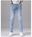 Vorderansicht von hellblauen Stretch-Jeans für Herren in Slim-Passform - 28 / Unterteile / Hellblau